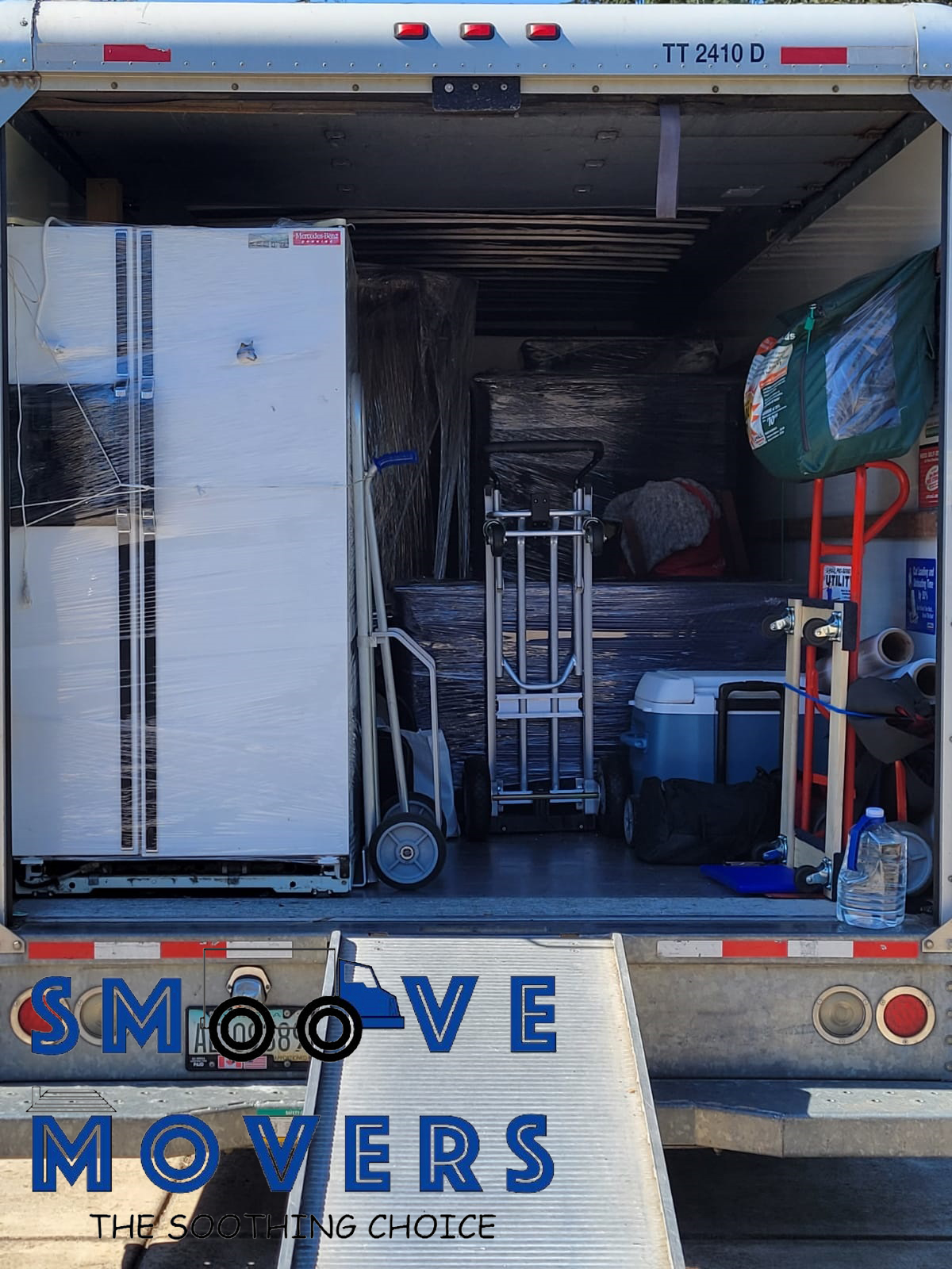 smoove movers unloading large boxes